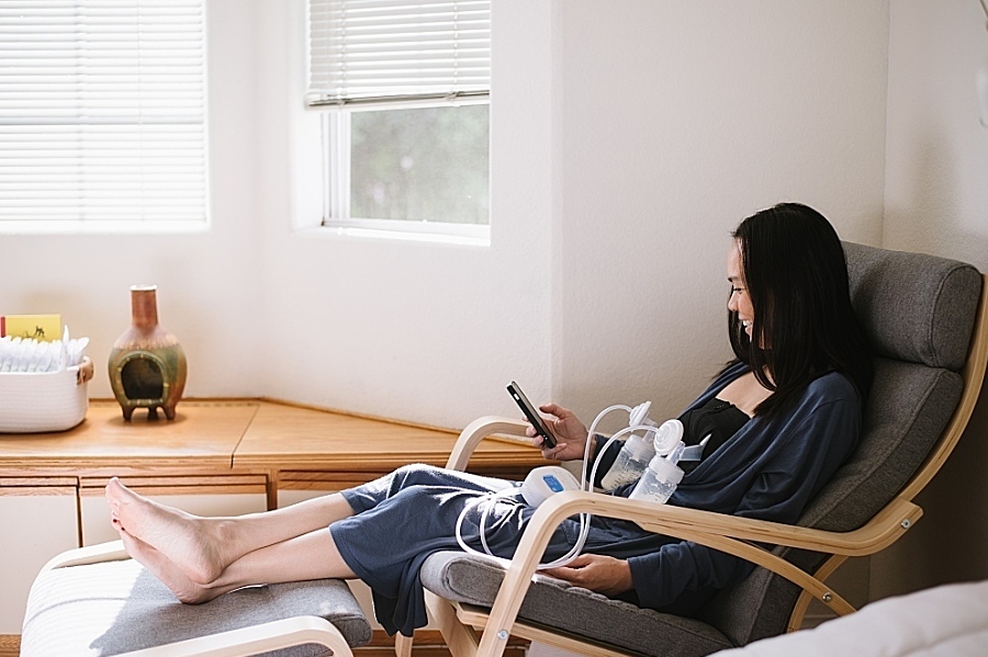 A woman using a breast pump
