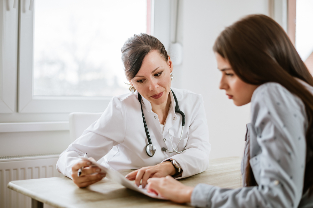 A doctor meeting with a patient