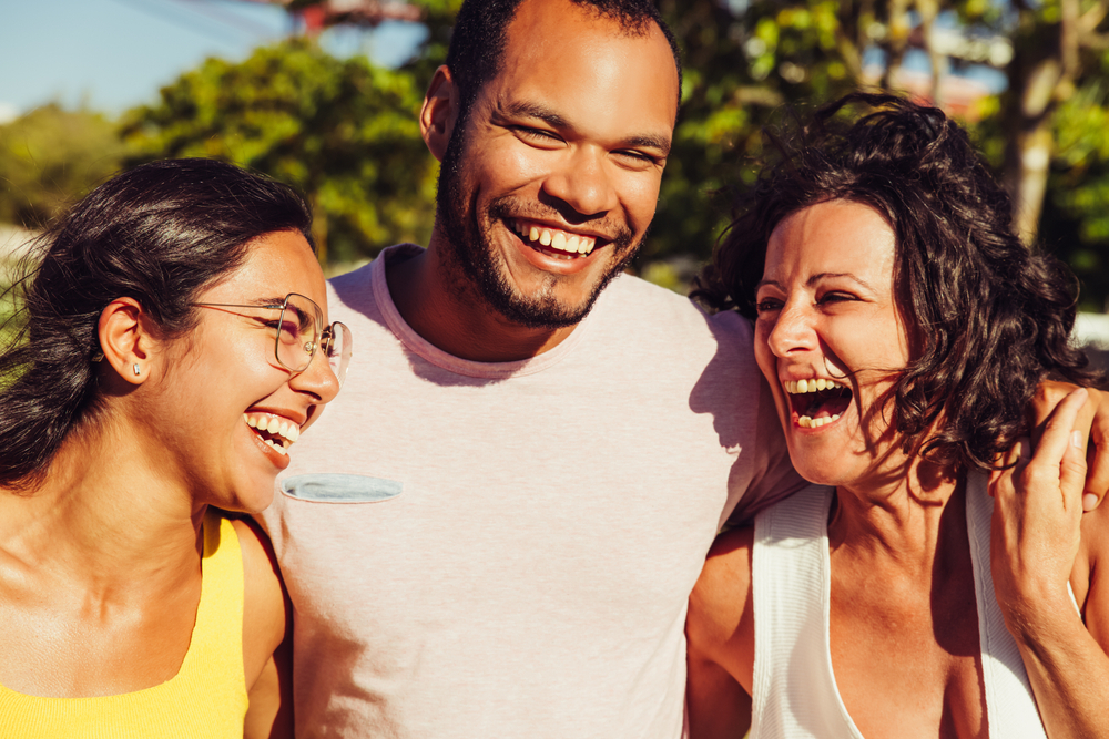 Friends laughing outside.