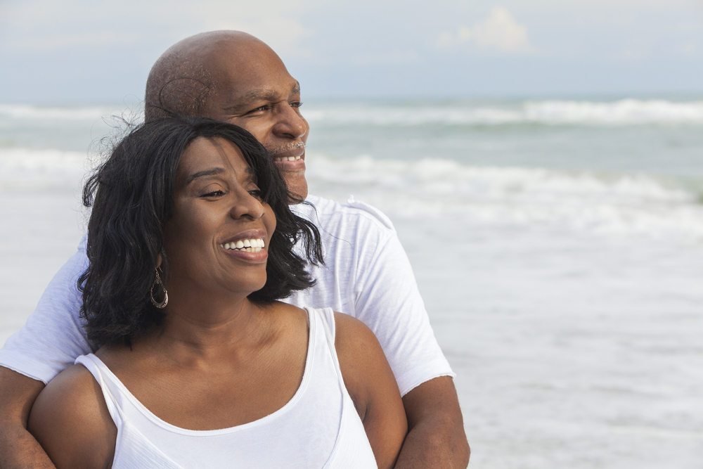 An older couple on the beach.