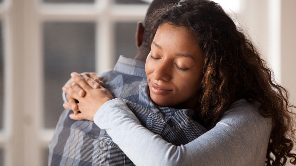A caregiver enjoys a quiet moment with their partner