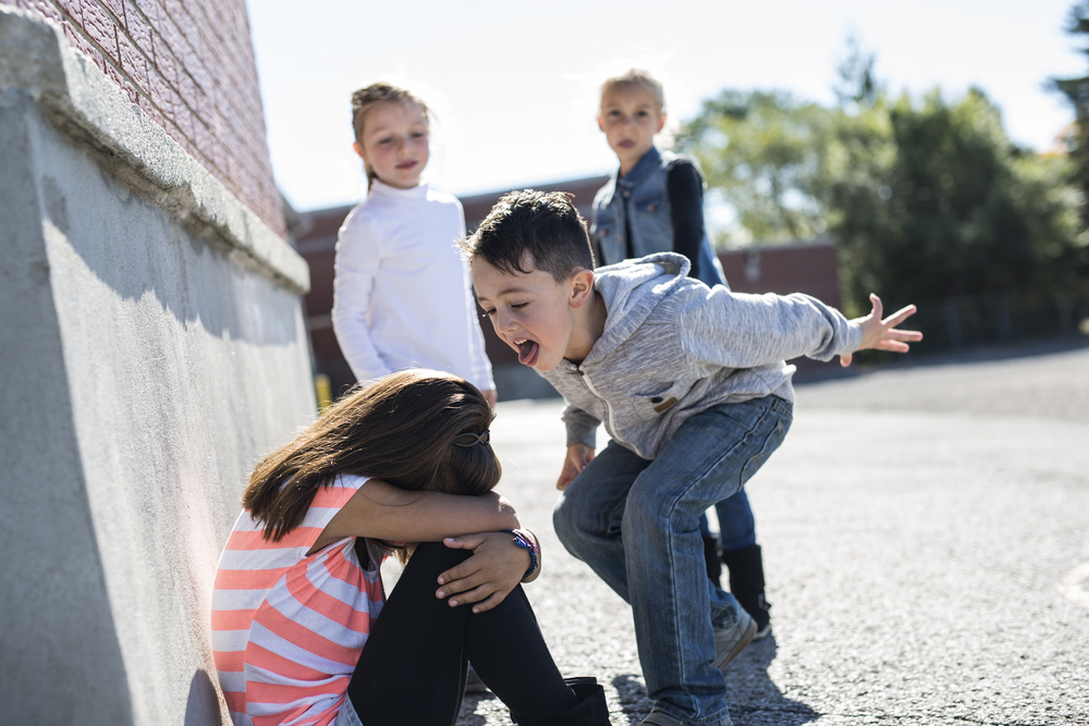 A girl being bullied.