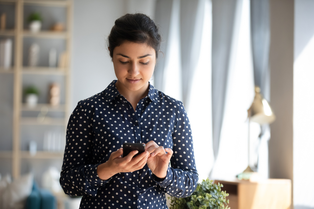 A woman using her phone