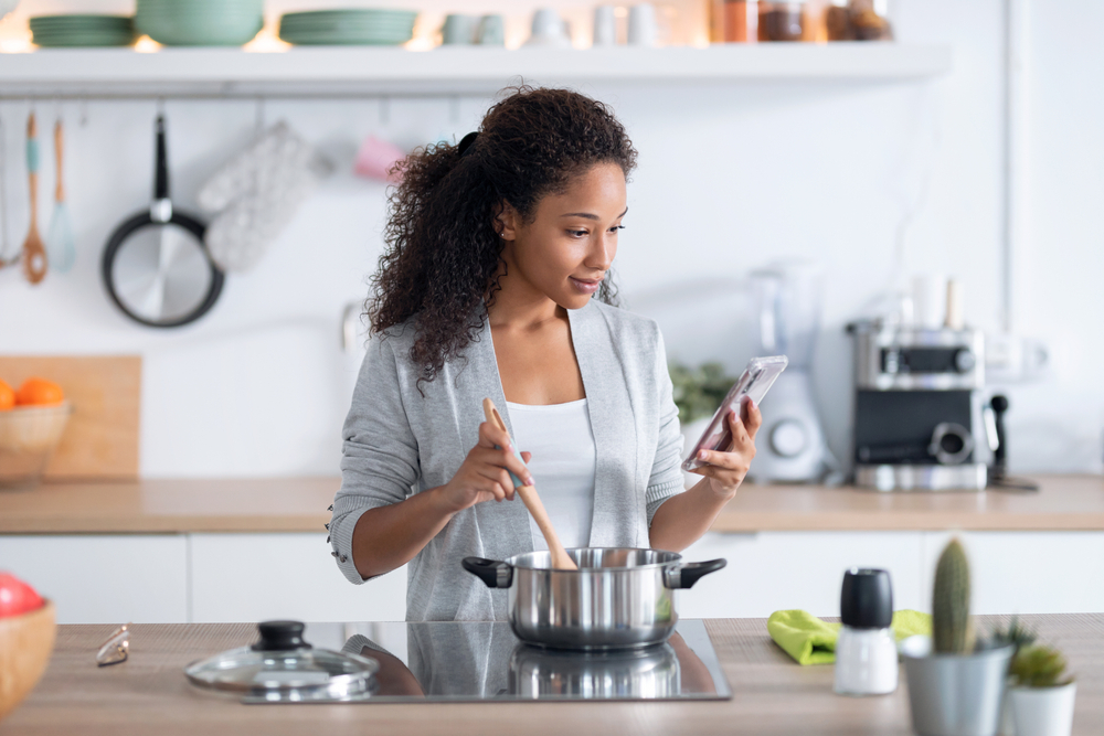 A woman cooking at home