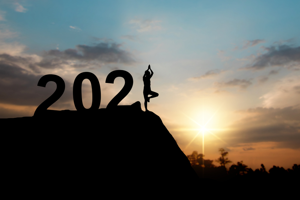 Silhouette of the year "2021," with a person as the one