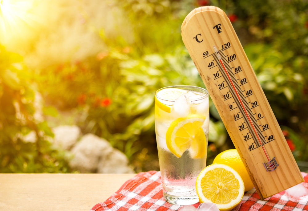 A thermometer shows a high temperature during a heatwave