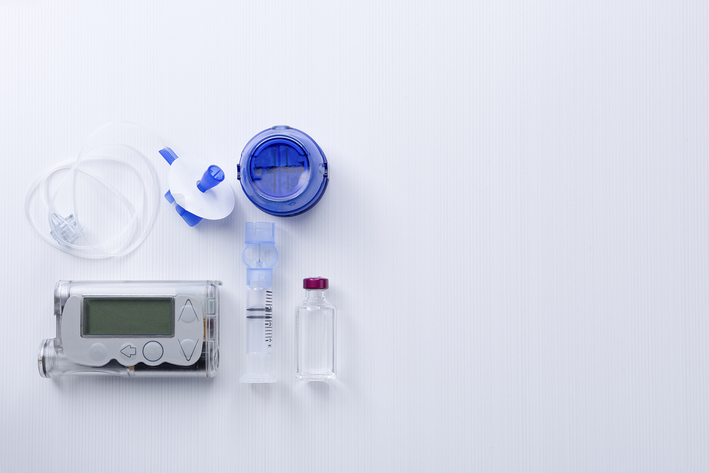 An insulin pump system consisting of an electronic device, reservoir, insertion device, and insulin.
