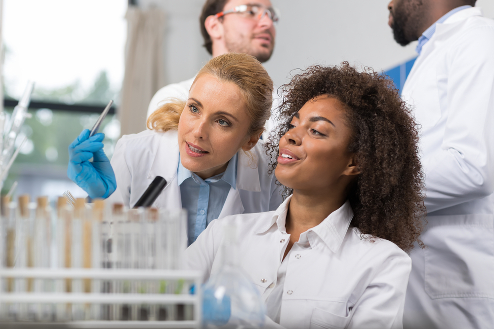 Two women looking at samples side by side